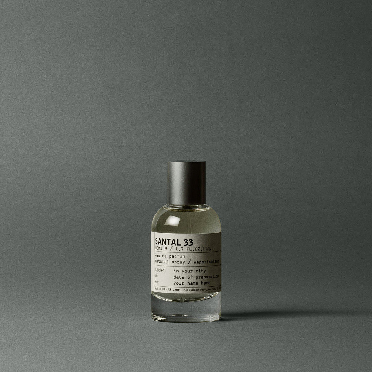 Le Labo Santal 33 Eau de Parfum original bottle reference. Your order contains a Scent Wear decant; retail bottle not included.